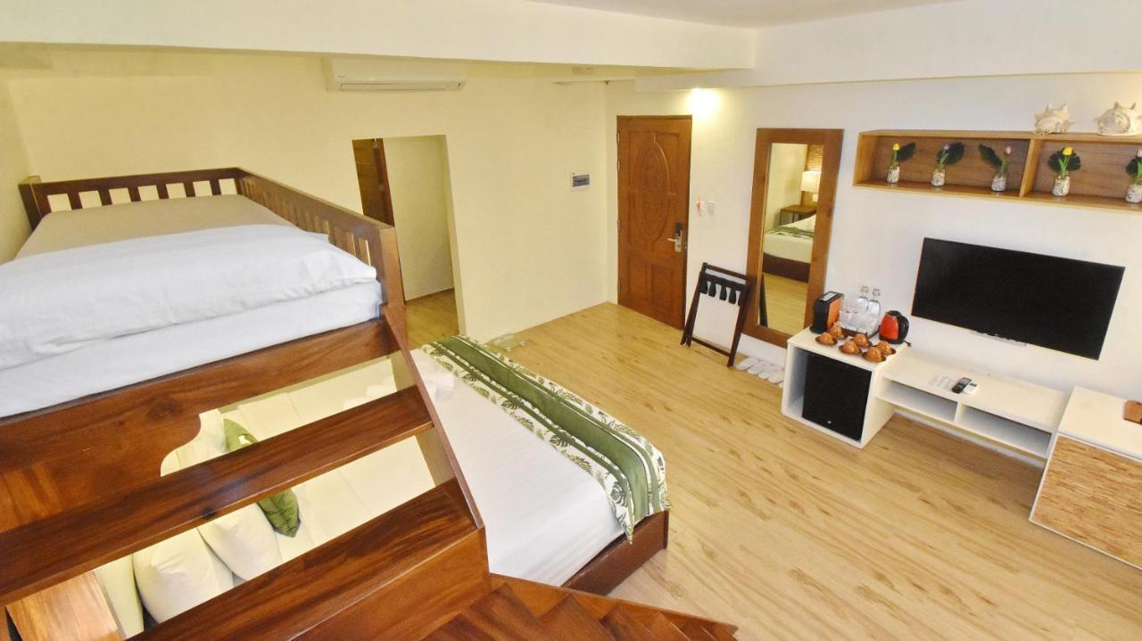 Ambassador In Paradise Balabag  Esterno foto A typical bedroom in the residence halls