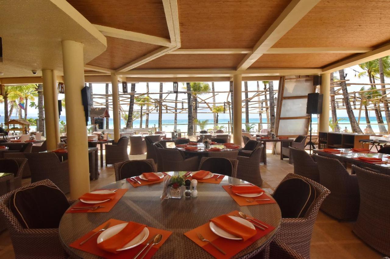 Ambassador In Paradise Balabag  Esterno foto The restaurant at the resort